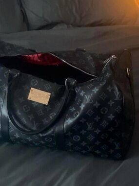 Louis Vuitton Black Monogram Duffle with Red Interior